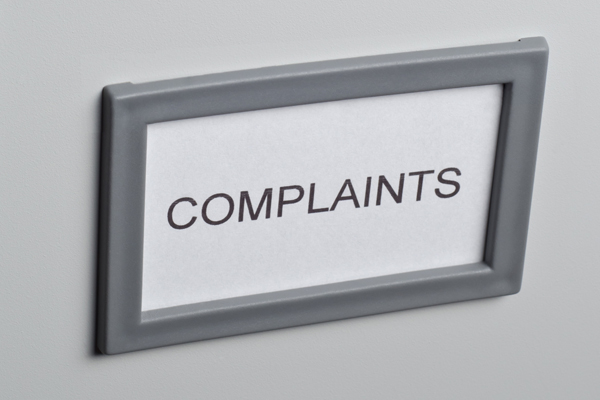 a filing cabinet labeled 'Complaints'