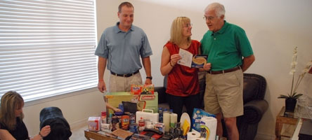 Picture of people building a disaster supply kit