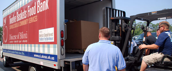 Graphic unloading a tractor trailer with a fork lift