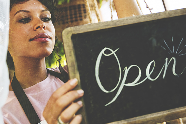 a woman opening her business