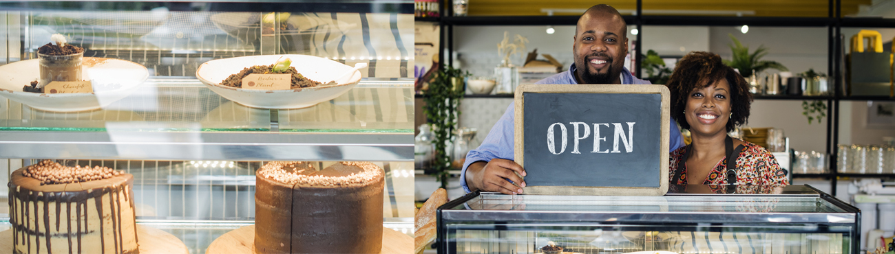 a man and a woman working in a bakery