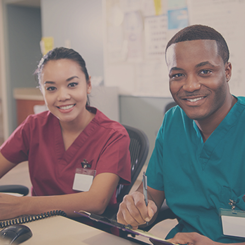 two nurses smiling