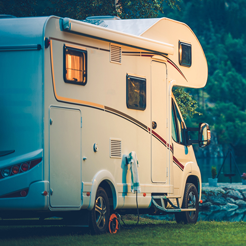 an RV parked on grass