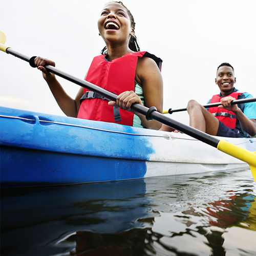 people paddling in a kayak