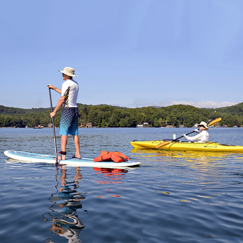 a person riding a paddleboard