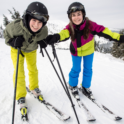 two people skiing