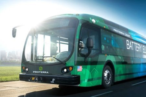 a bus driving down a road